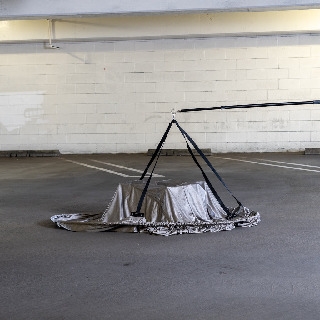 DroneCloak seated over a drone with the deployment pole released